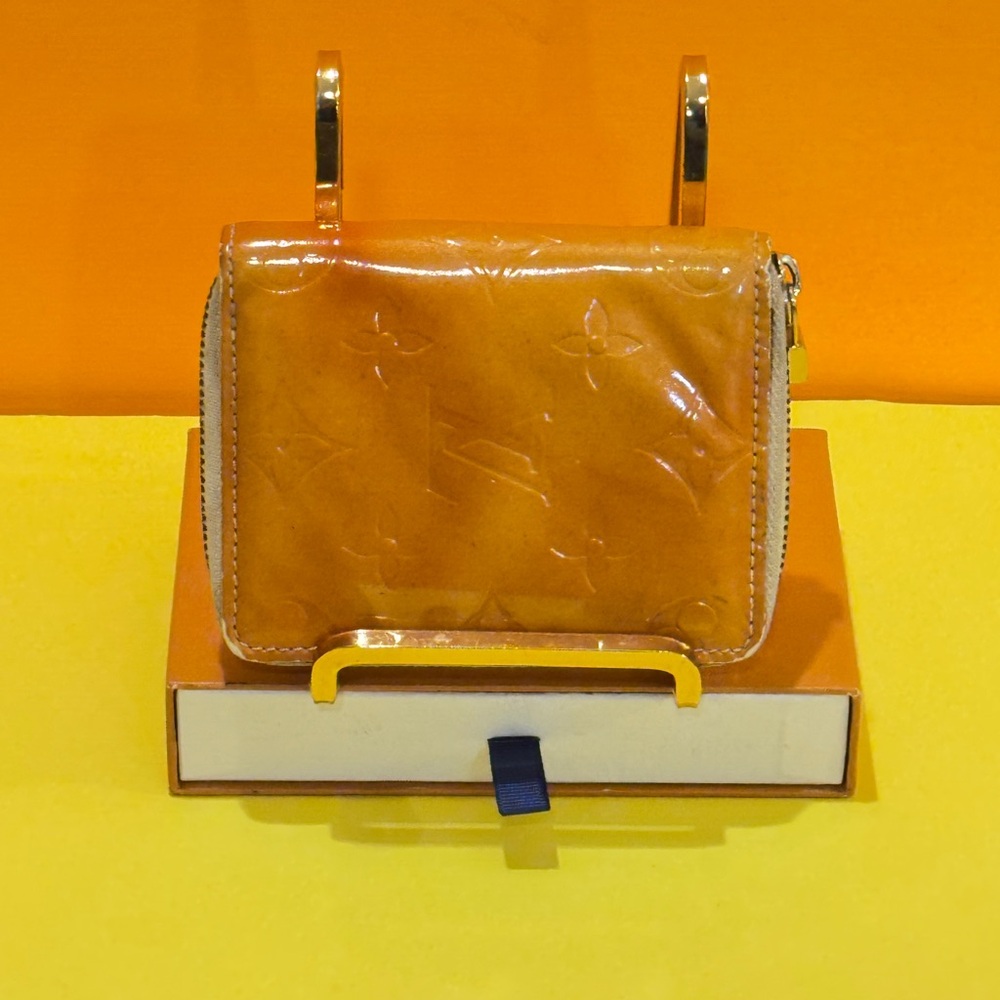 Louis Vuitton Printed monogram tine wallet